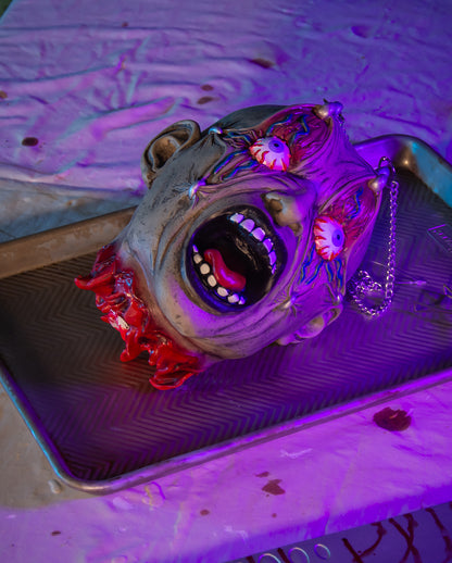 Cabeza Cortada Con Ojos De Tortura