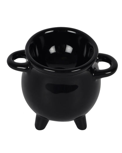 Hexenkessel mit Löffel als Eierbecher