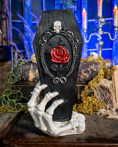 Skeleton Hand With Black Coffin 25cm